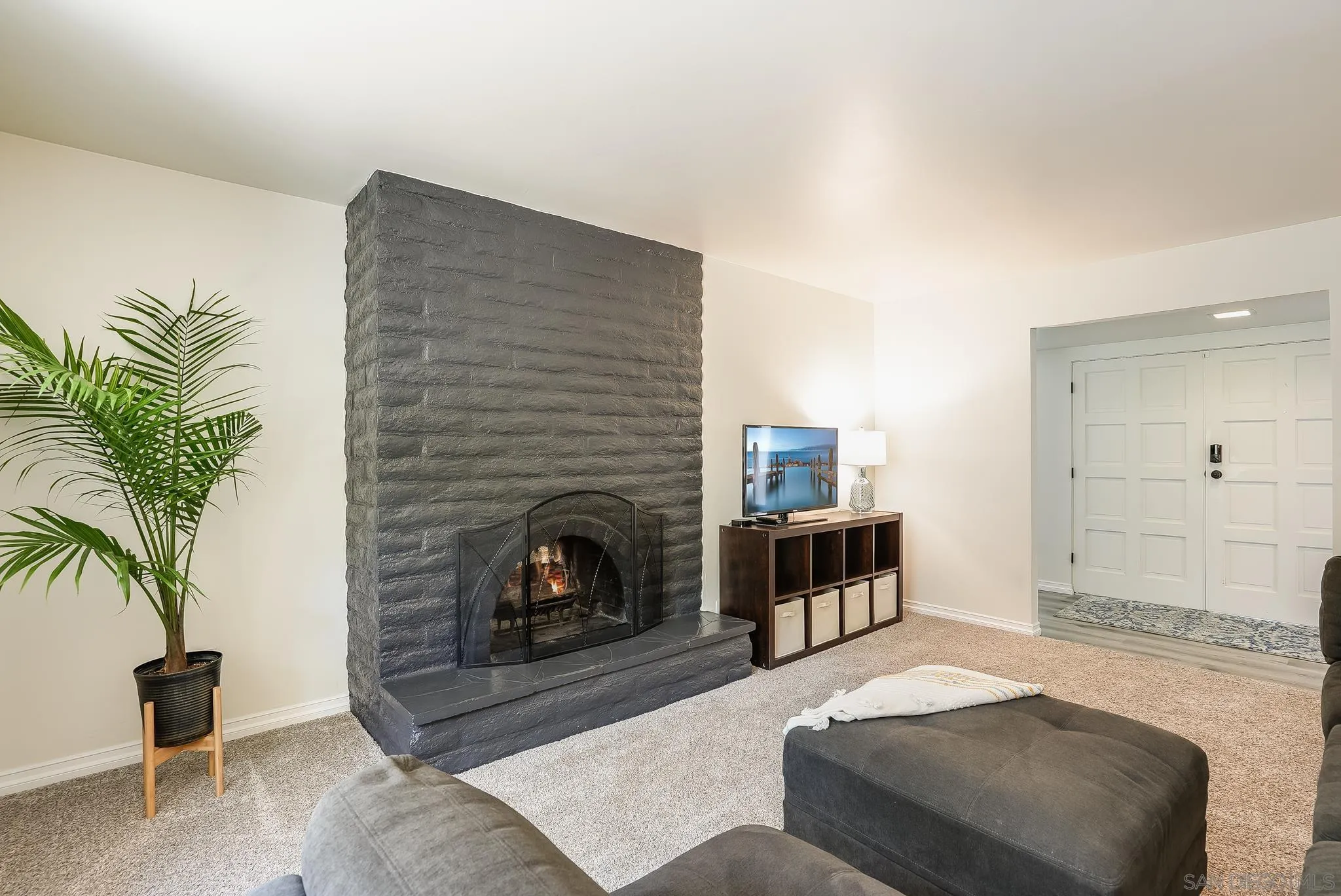 2211 Sunset Drive Escondido, CA 92025 - Photo 17 of 43 a living room with furniture and a fireplace