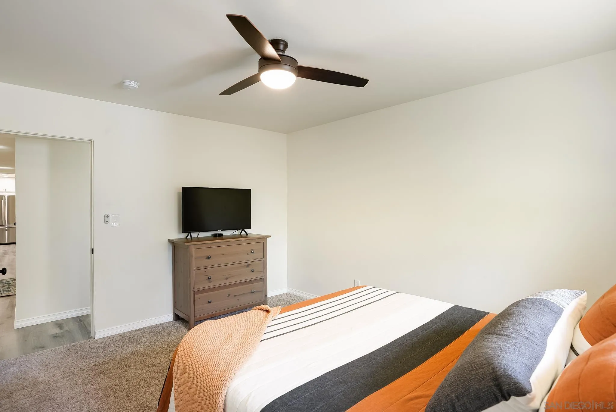 2211 Sunset Drive Escondido, CA 92025 - Photo 26 of 43 a bedroom with a bed and a television