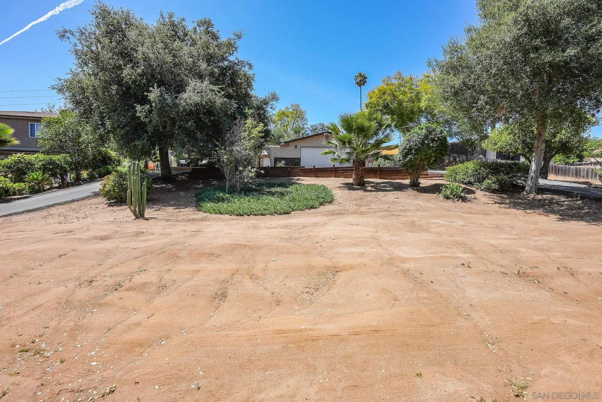 2211 Sunset Drive Escondido, CA 92025 - Photo 31 of 43 a pathway of a house with a yard