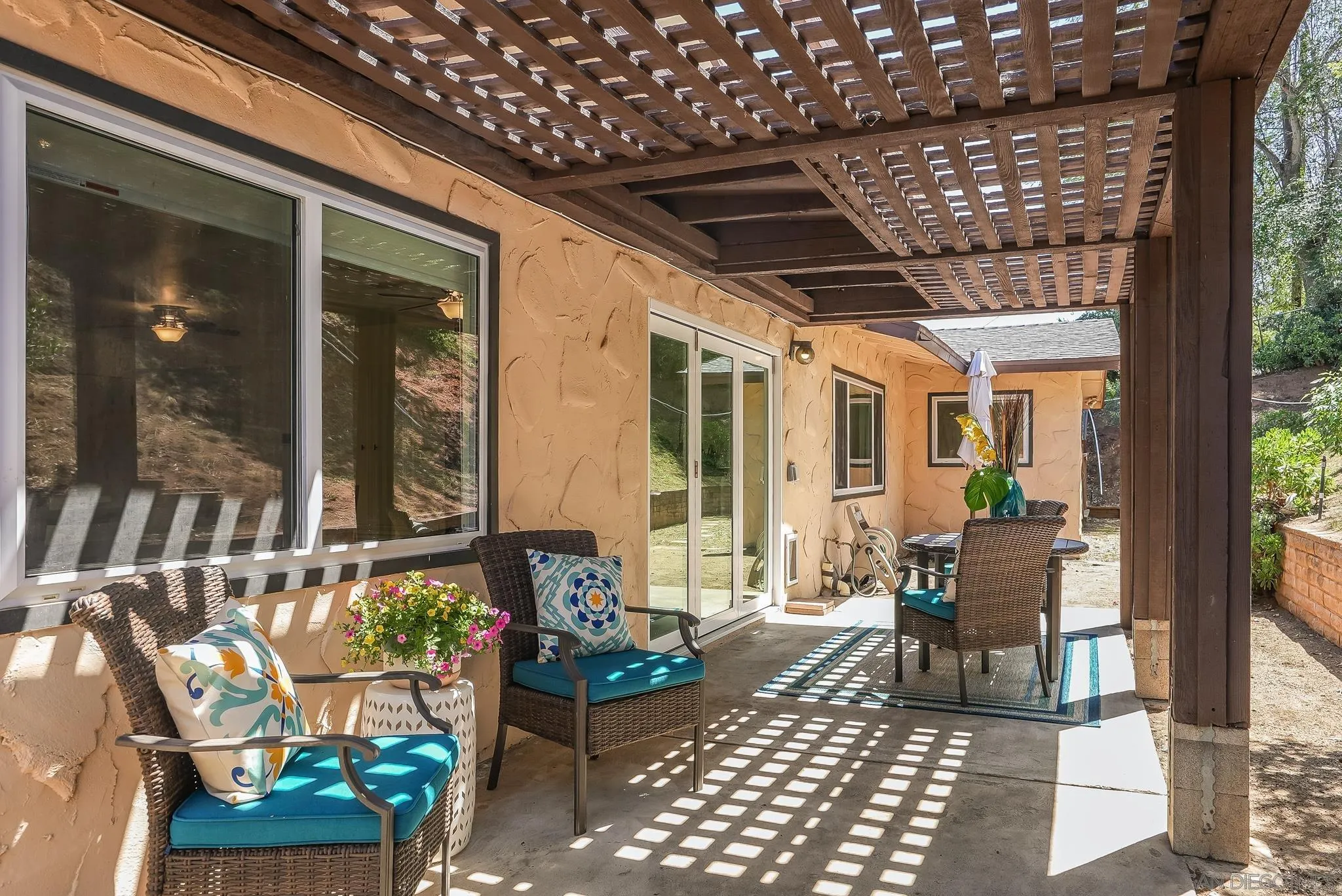 2211 Sunset Drive Escondido, CA 92025 - Photo 38 of 43 a building outdoor space with patio furniture and potted plants