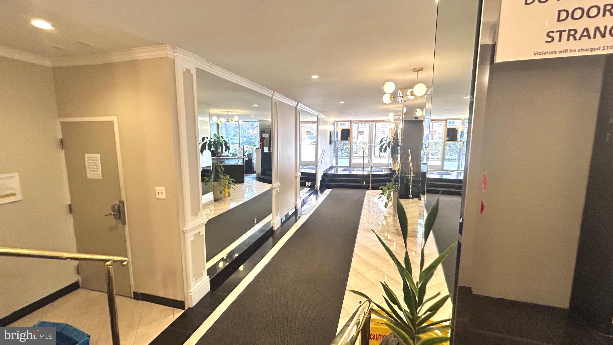 1239 Vermont Avenue Northwest, Unit 204 Washington, DC 20005 - Photo 31 of 39 a bathroom with a bathtub and a shower