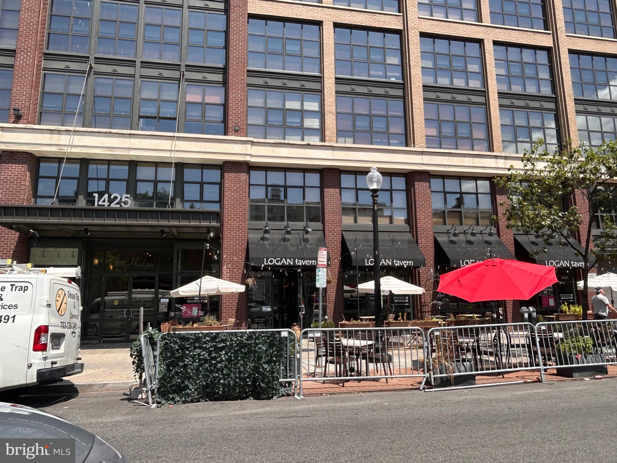 1239 Vermont Avenue Northwest, Unit 204 Washington, DC 20005 - Photo 33 of 39 a view of a cafe with sitting area