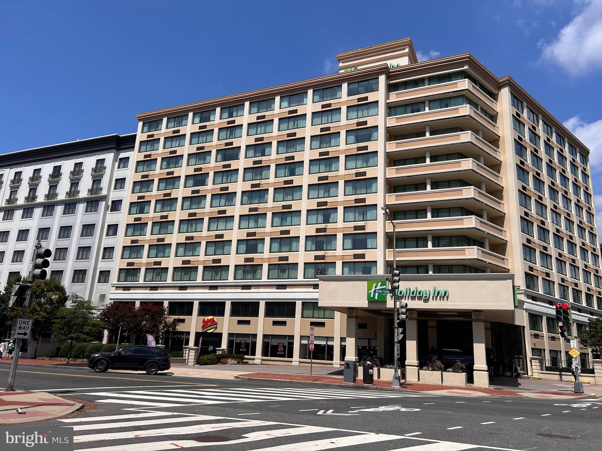 1239 Vermont Avenue Northwest, Unit 204 Washington, DC 20005 - Photo 34 of 39 front view of a building with a street