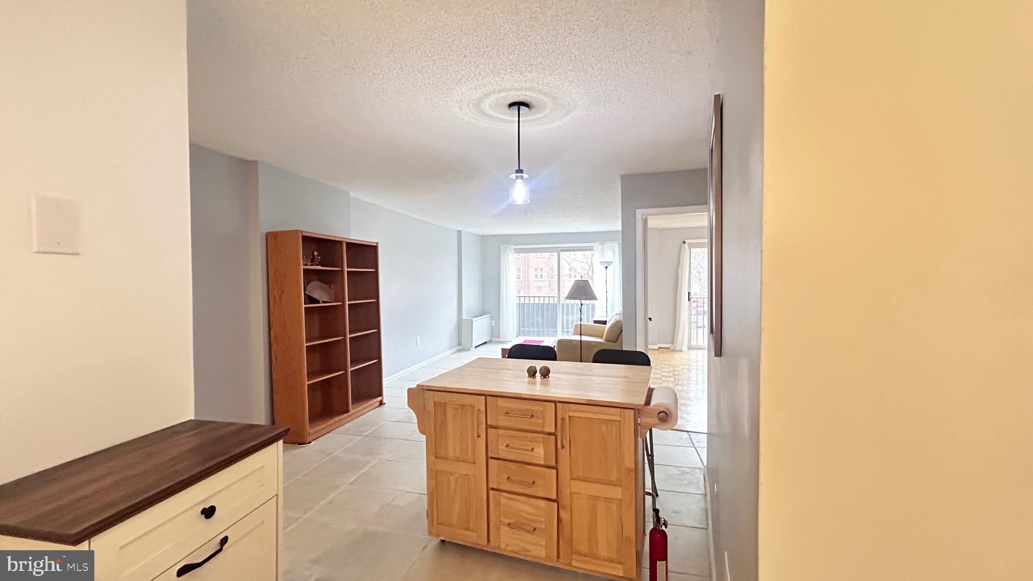 1239 Vermont Avenue Northwest, Unit 204 Washington, DC 20005 - Photo 10 of 39 a room with storage and utility