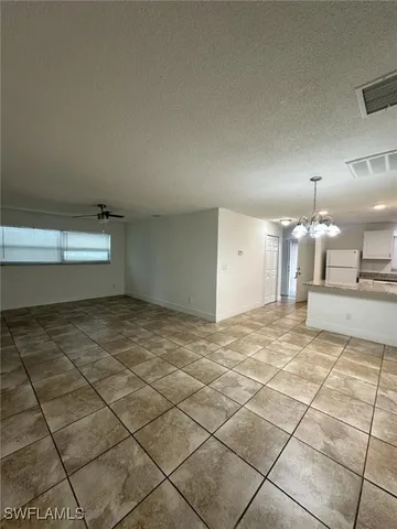 a view of a room & utility room