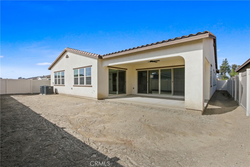 4685 Avondale Court Chino, CA 91710 - Photo 16 of 16 a view of a house with a backyard
