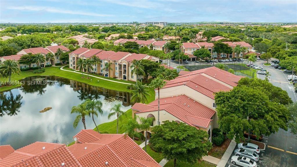 2031 Renaissance Boulevard, Unit 106 Miramar, FL 33025 - Photo 11 of 19 an aerial view of a house with a lake view