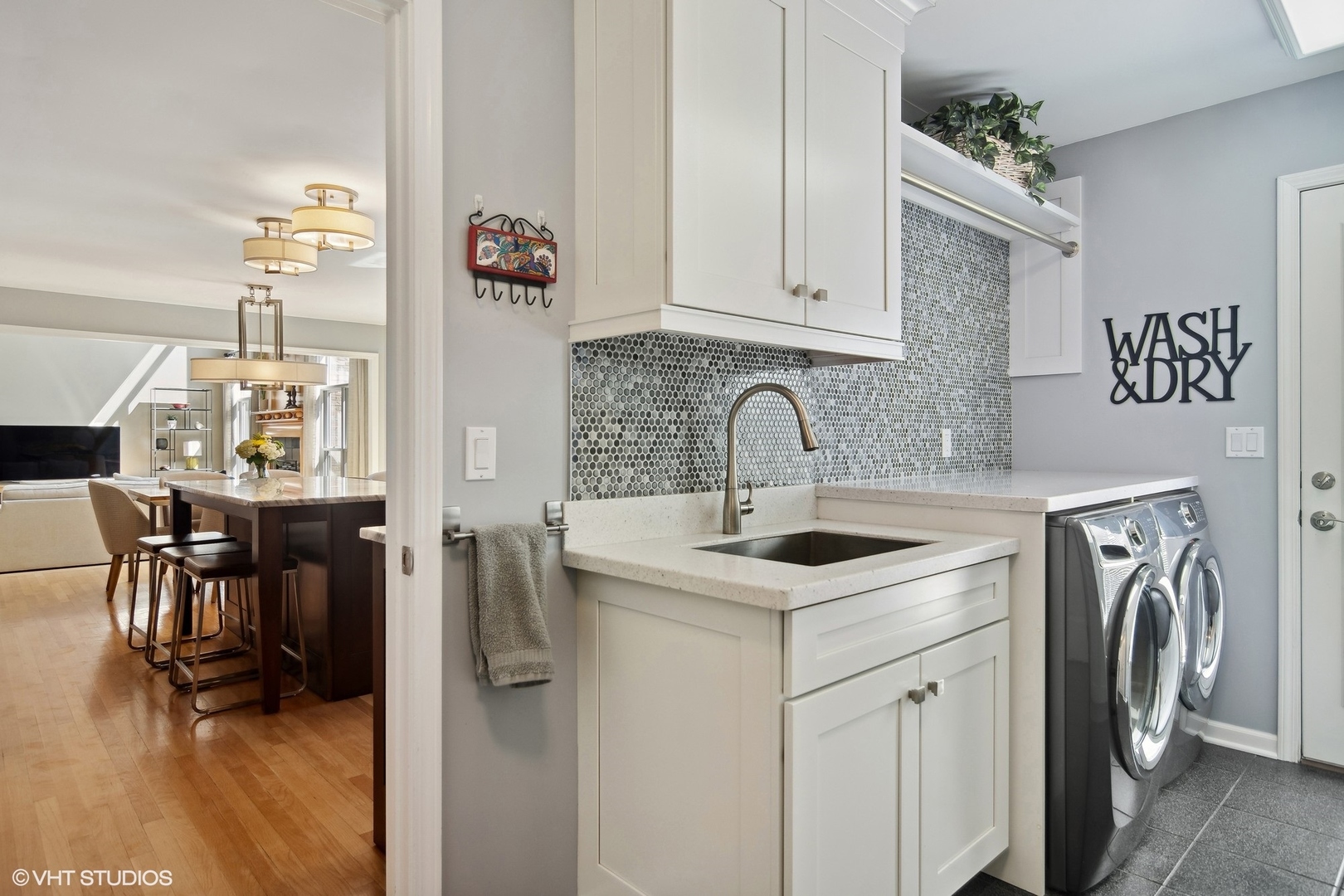 716 Saddle Ridge Crystal Lake, IL 60012 - Photo 15 of 42 a kitchen with stainless steel appliances kitchen island a refrigerator sink and cabinets