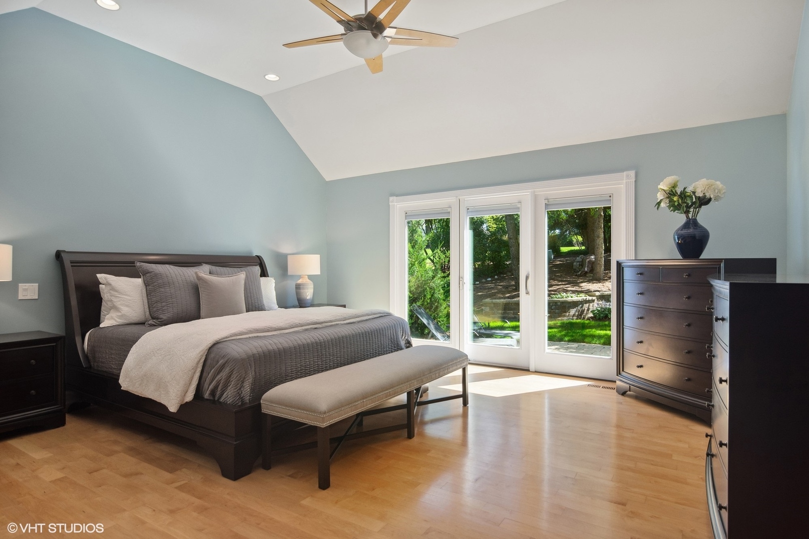 716 Saddle Ridge Crystal Lake, IL 60012 - Photo 17 of 42 a spacious bedroom with a bed and wooden floor