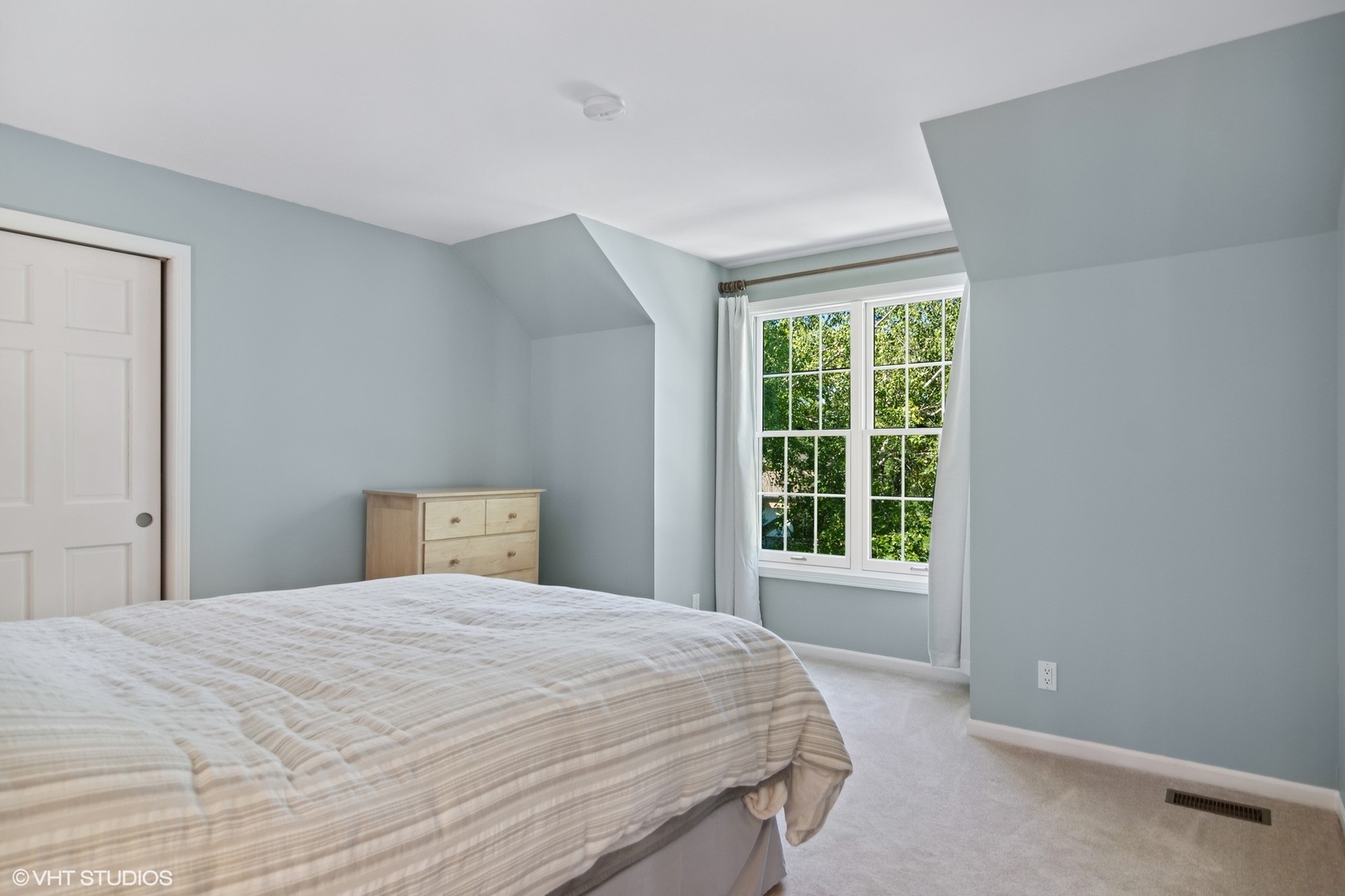 716 Saddle Ridge Crystal Lake, IL 60012 - Photo 21 of 42 a bedroom with a bed and a window
