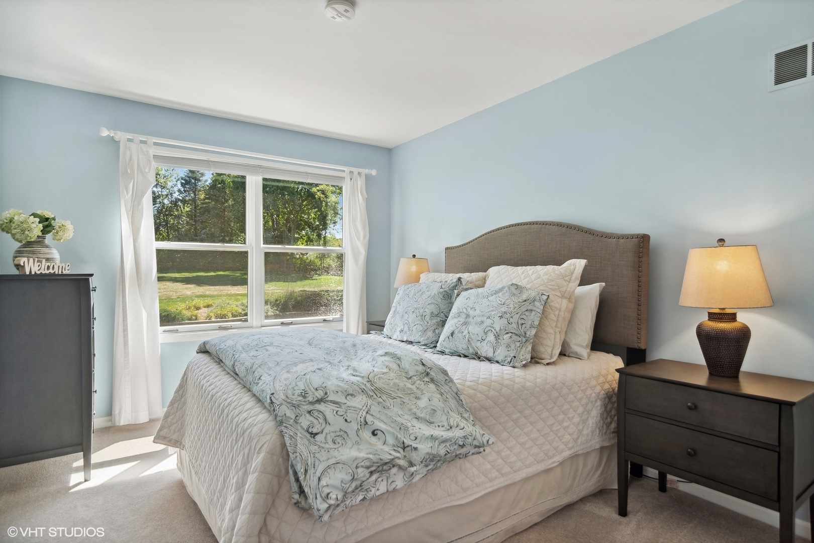 716 Saddle Ridge Crystal Lake, IL 60012 - Photo 22 of 42 a bedroom with a bed and window