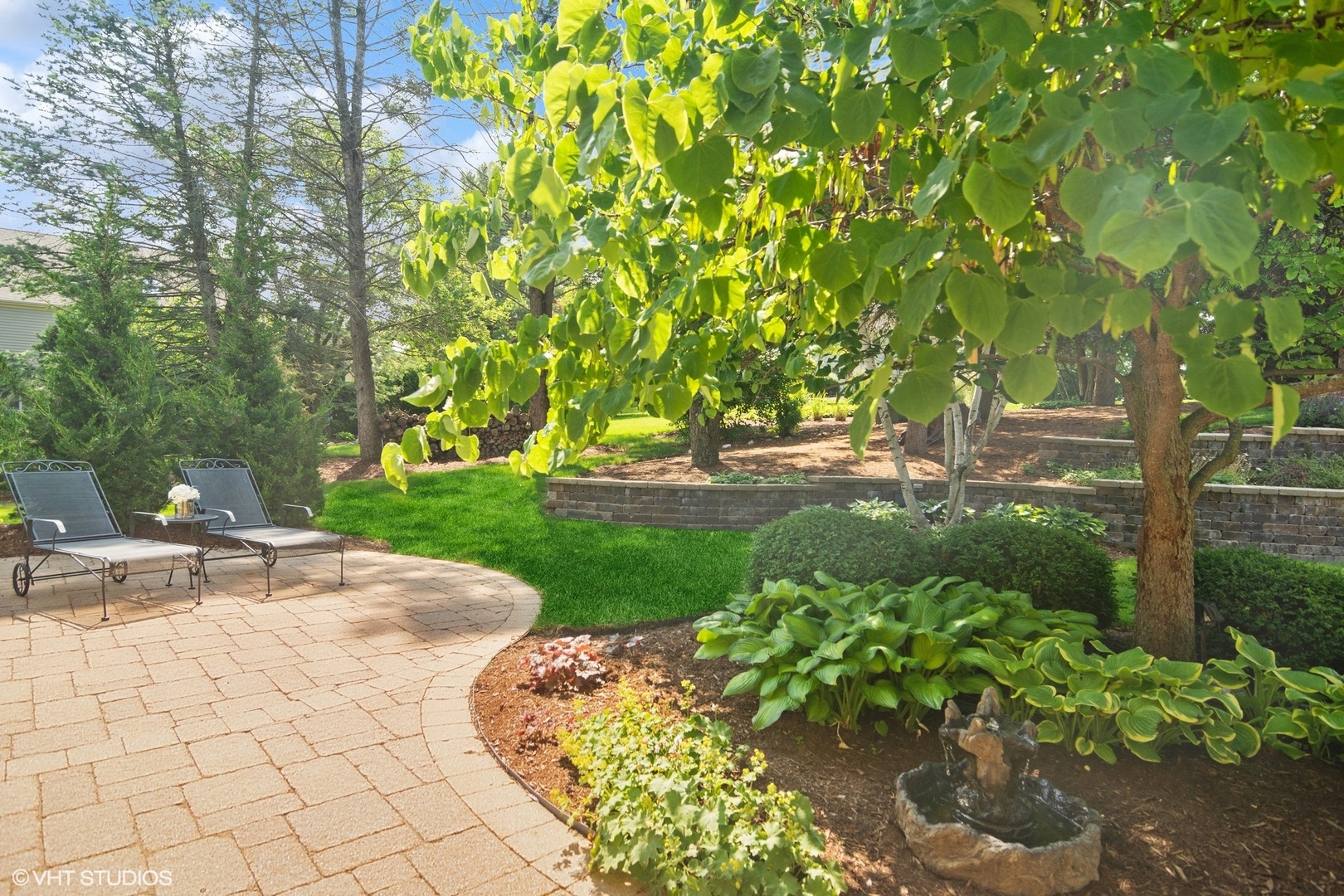 716 Saddle Ridge Crystal Lake, IL 60012 - Photo 29 of 42 a view of a garden with plants