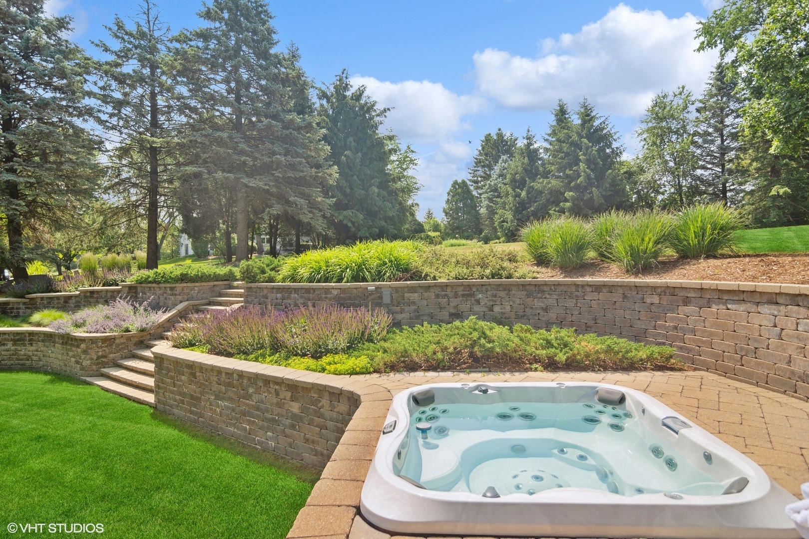 716 Saddle Ridge Crystal Lake, IL 60012 - Photo 32 of 42 a view of a garden in a yard