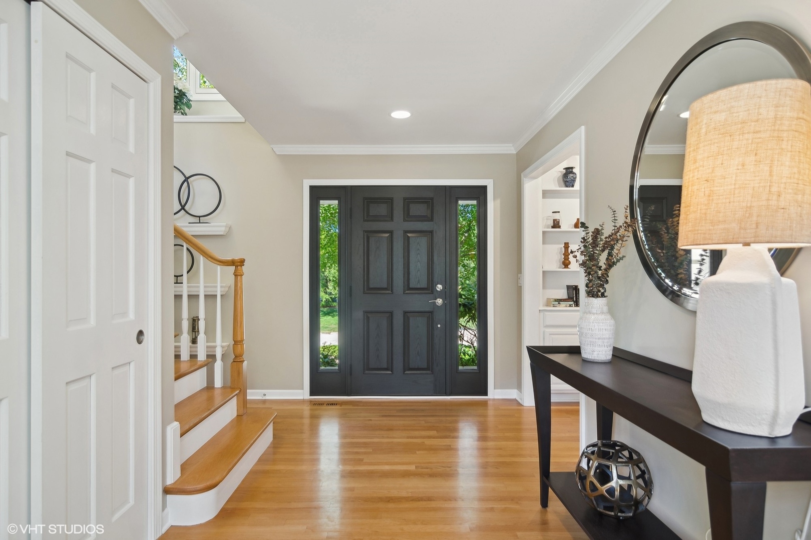 716 Saddle Ridge Crystal Lake, IL 60012 - Photo 7 of 42 a view of an entryway with wooden floor