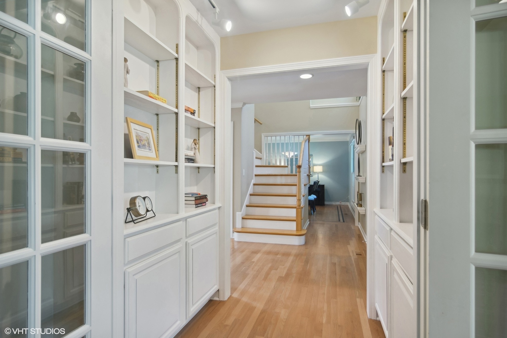 716 Saddle Ridge Crystal Lake, IL 60012 - Photo 10 of 42 a view of a hallway with wooden floor and staircase
