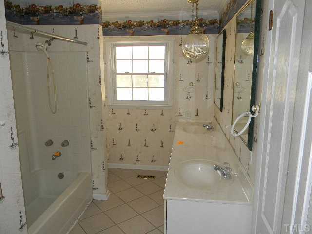2705 Trawick Road Raleigh, NC 27604 - Photo 6 of 9 a bathroom with a shower