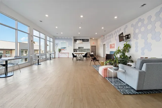 a living room with furniture and a table