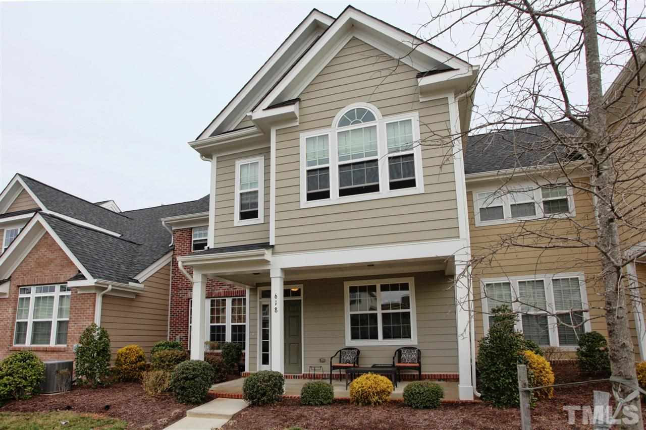 618 Democracy Street Raleigh, NC 27603 - Photo 1 of 24 a front view of a house with a yard