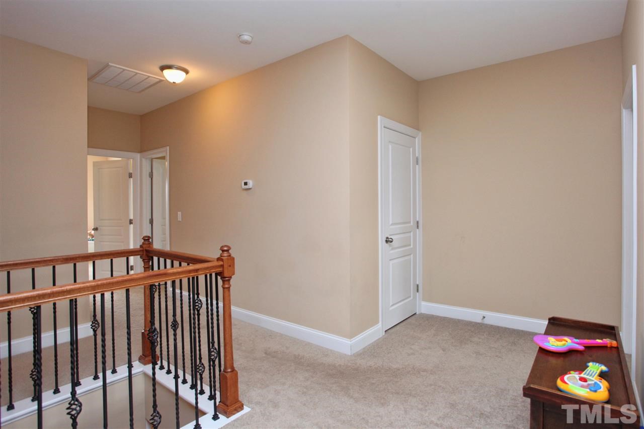 618 Democracy Street Raleigh, NC 27603 - Photo 13 of 24 a view of hallway with stairs
