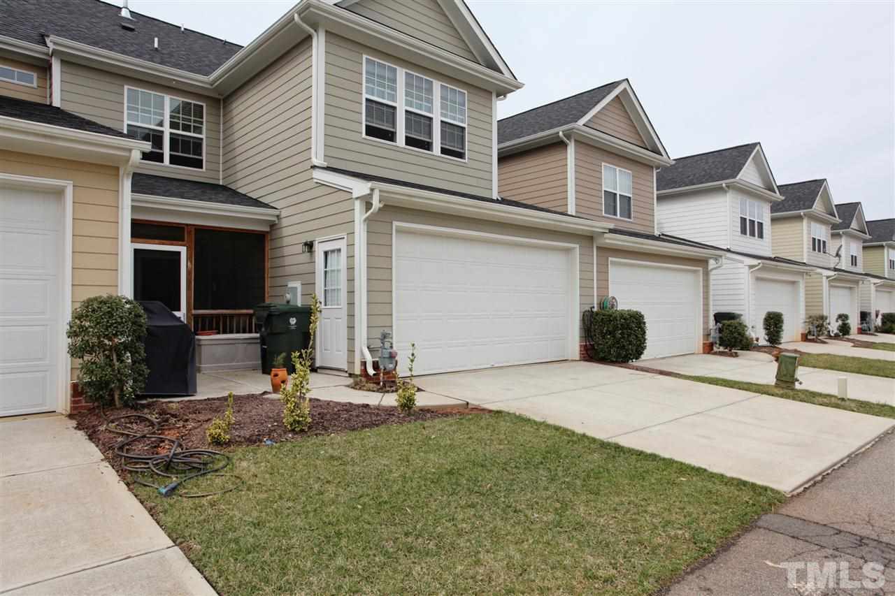 618 Democracy Street Raleigh, NC 27603 - Photo 23 of 24 a view of a house with backyard and sitting area