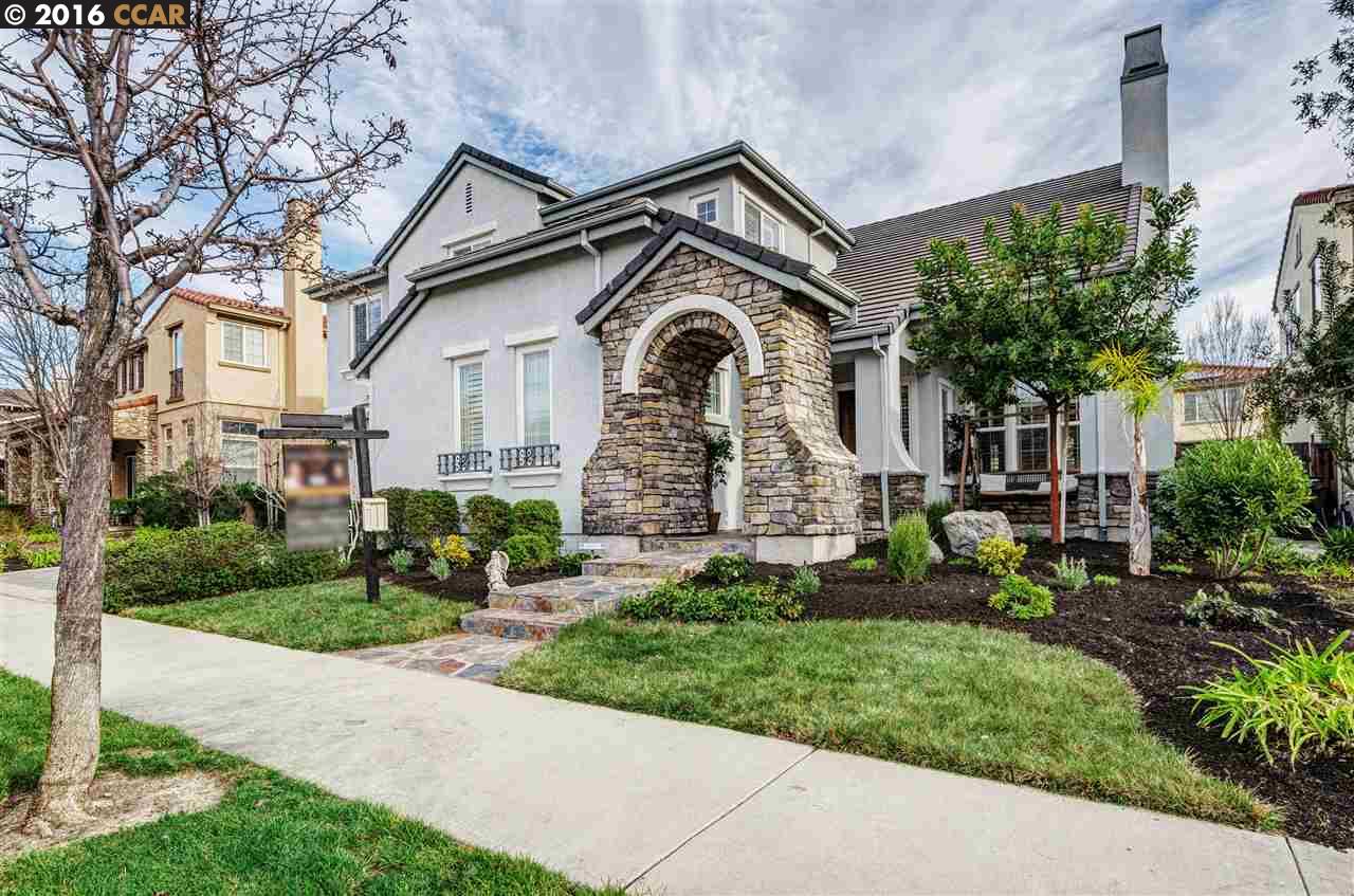 3056 Hastings Way San Ramon, CA 94582 - Photo 1 of 1 a front view of a house with a garden and trees