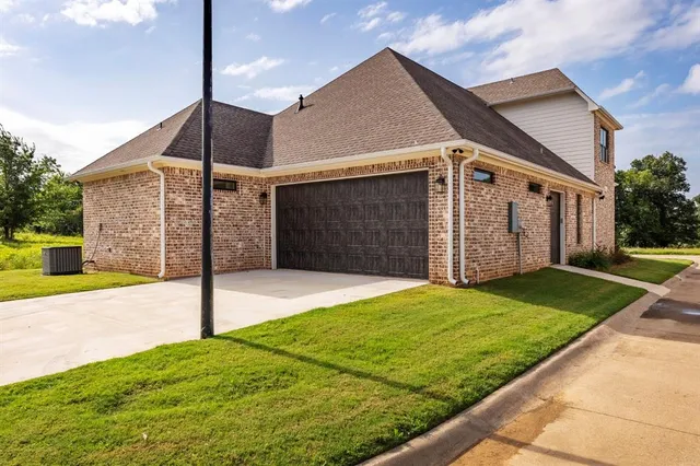 a view of a backyard of the house