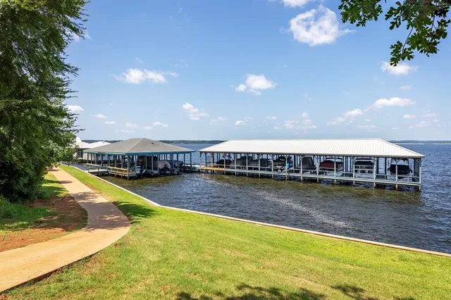 an aerial view of a house having outdoor space patio and sitting space