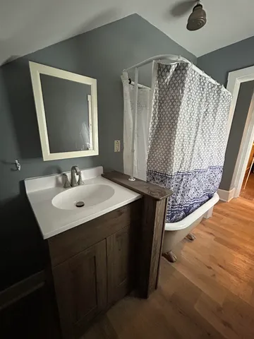 a bathroom with a sink and a mirror