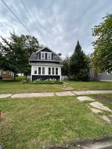 a view of a house with a big yard