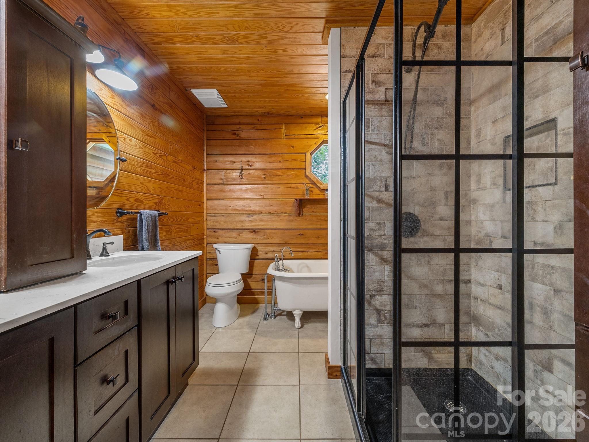 270 Cross Ridge Drive Rutherfordton, NC 28139 - Photo 13 of 38 a bathroom with a toilet sink and mirror