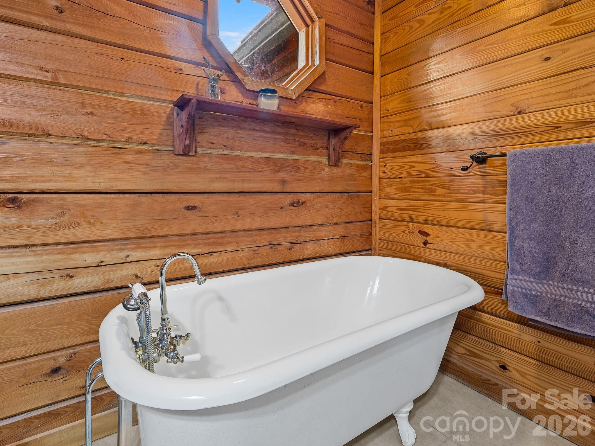 270 Cross Ridge Drive Rutherfordton, NC 28139 - Photo 14 of 38 a bathroom with a sink and bathtub