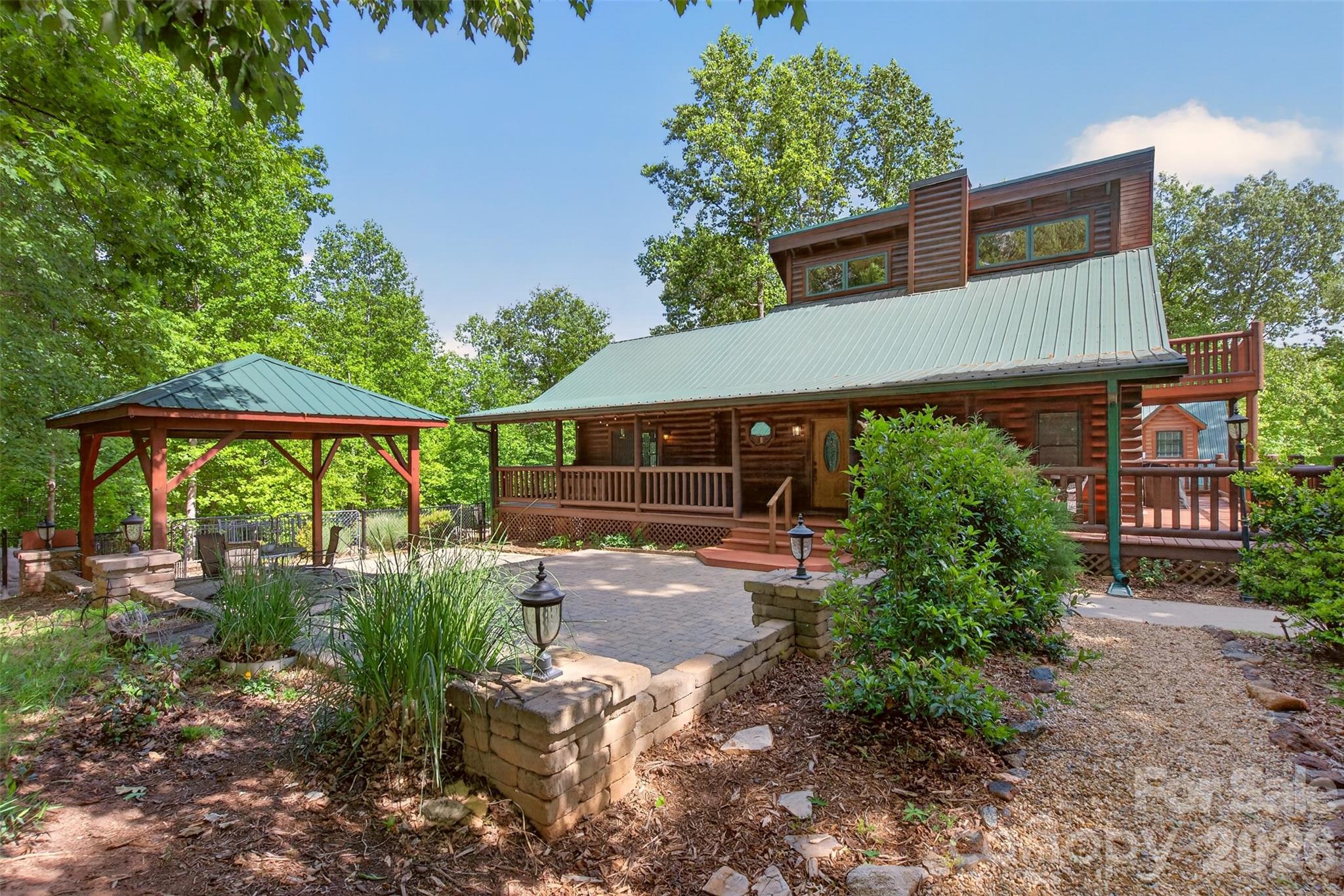 270 Cross Ridge Drive Rutherfordton, NC 28139 - Photo 2 of 38 front view of a house with a yard