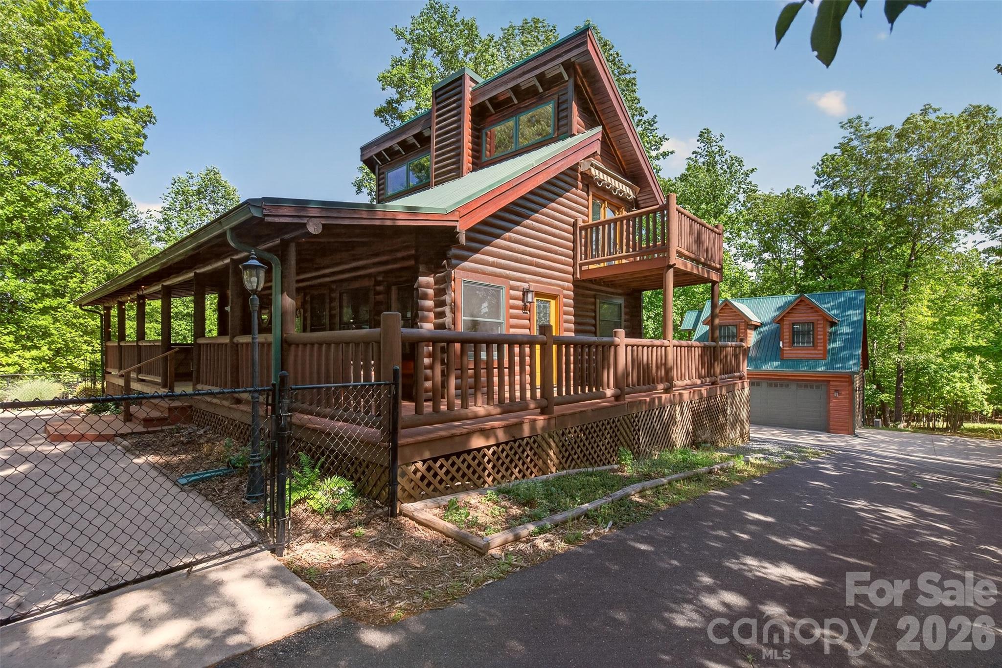 270 Cross Ridge Drive Rutherfordton, NC 28139 - Photo 22 of 38 a front view of a house with a yard