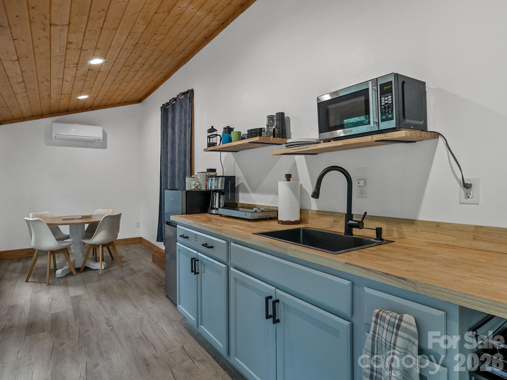 270 Cross Ridge Drive Rutherfordton, NC 28139 - Photo 23 of 38 a kitchen with sink and cabinets