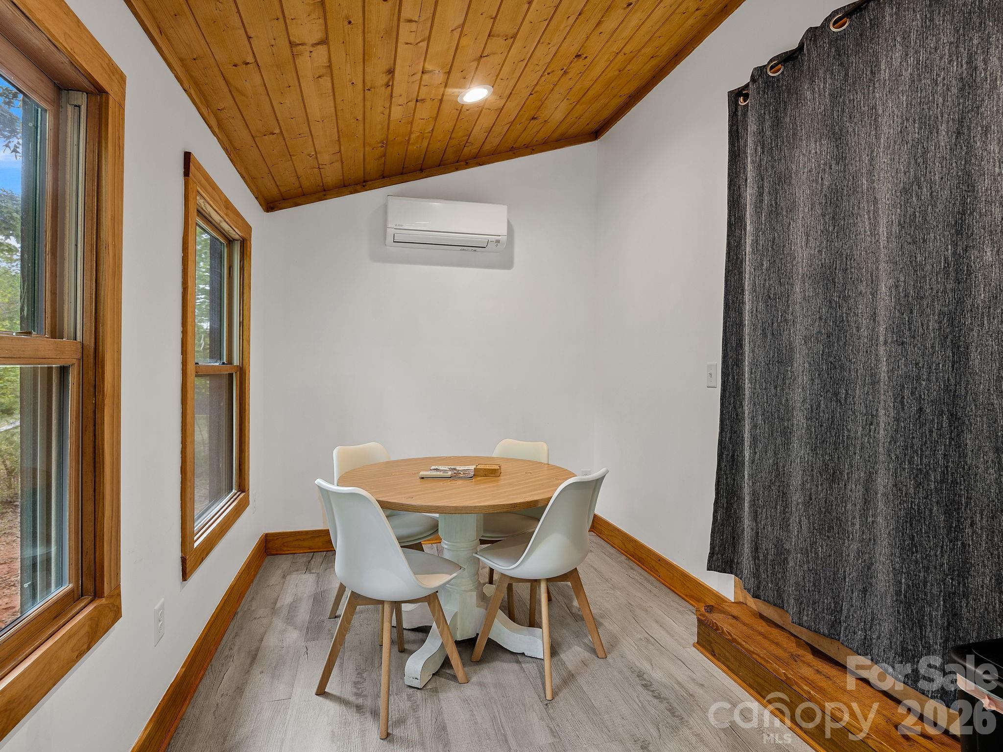 270 Cross Ridge Drive Rutherfordton, NC 28139 - Photo 24 of 38 a view of a dining room with furniture and wooden floor