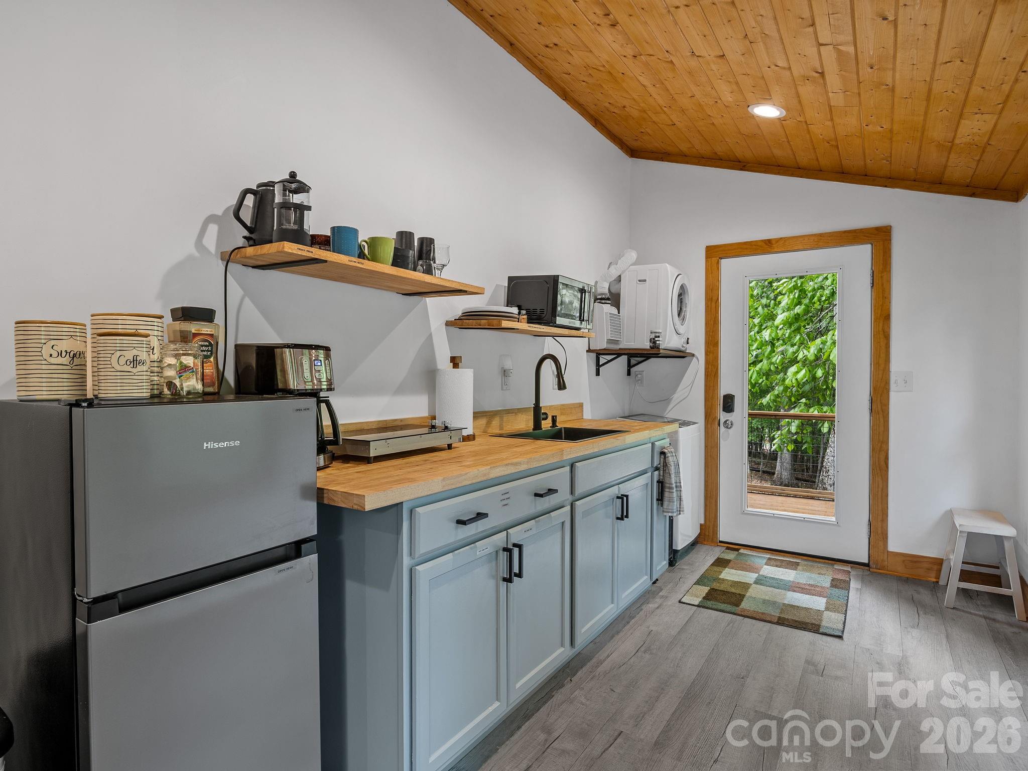 270 Cross Ridge Drive Rutherfordton, NC 28139 - Photo 26 of 38 a kitchen with a stove a refrigerator and a sink
