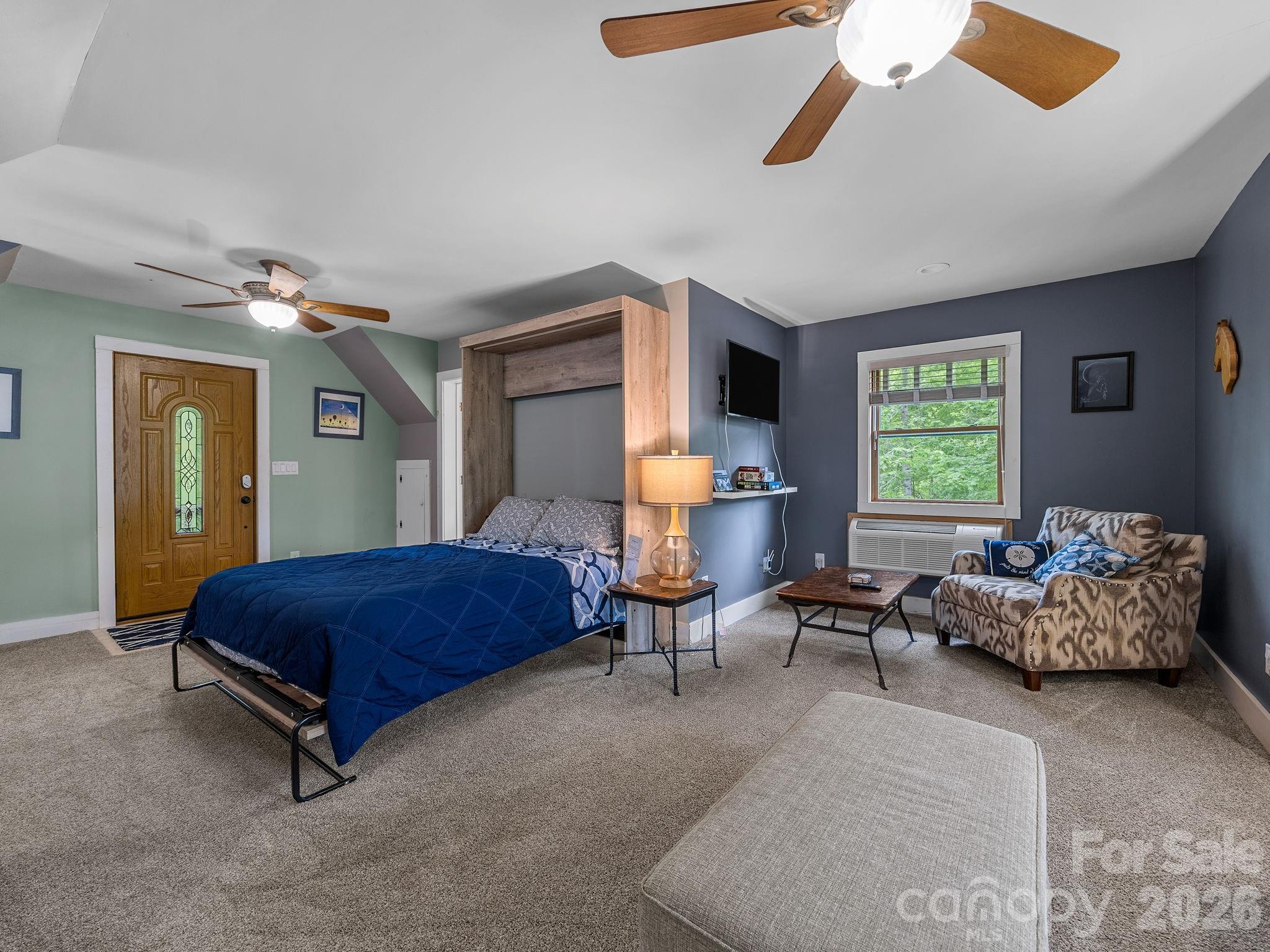 270 Cross Ridge Drive Rutherfordton, NC 28139 - Photo 29 of 38 a bedroom with furniture and a large window