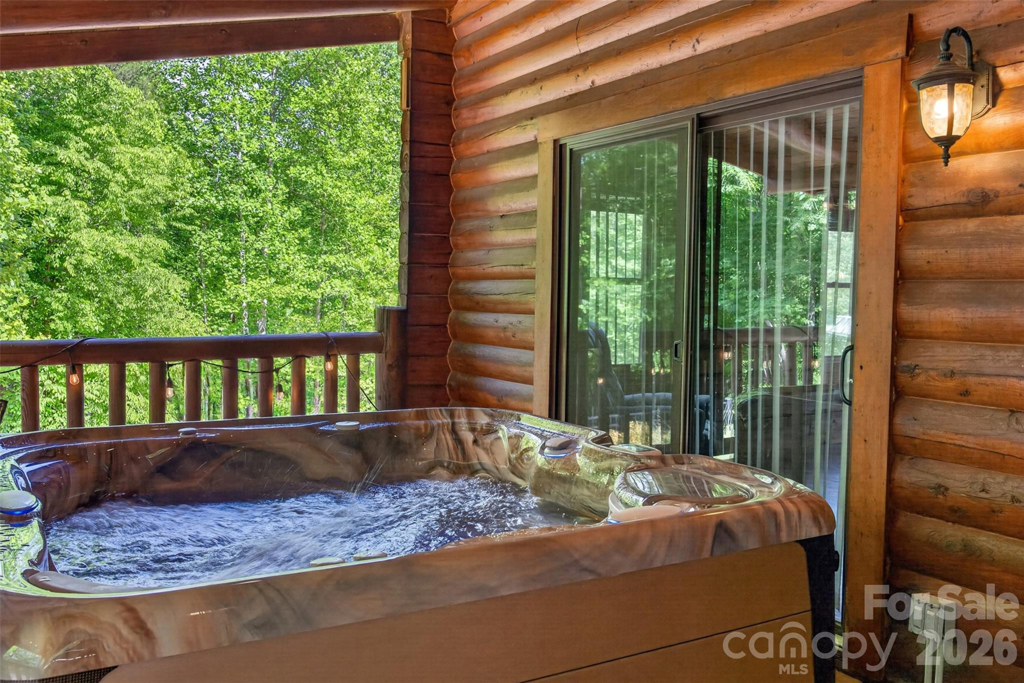 270 Cross Ridge Drive Rutherfordton, NC 28139 - Photo 33 of 38 a bed sitting in a bedroom next to a window