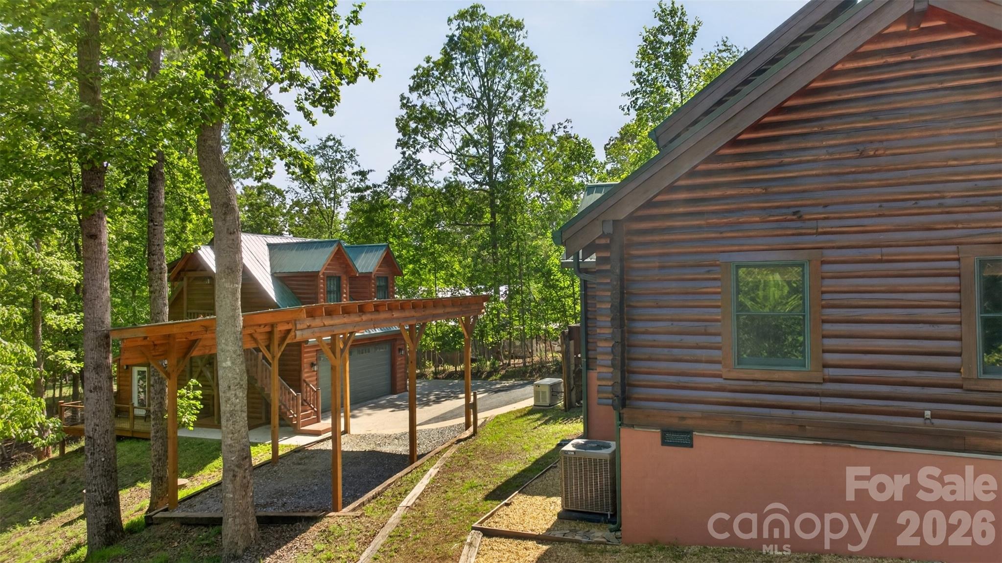270 Cross Ridge Drive Rutherfordton, NC 28139 - Photo 35 of 38 a view of a patio with table and chairs with wooden floor and fence