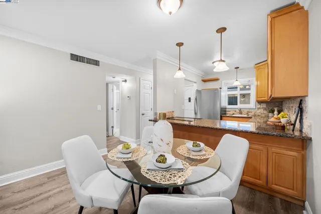 a view of a dining room with furniture