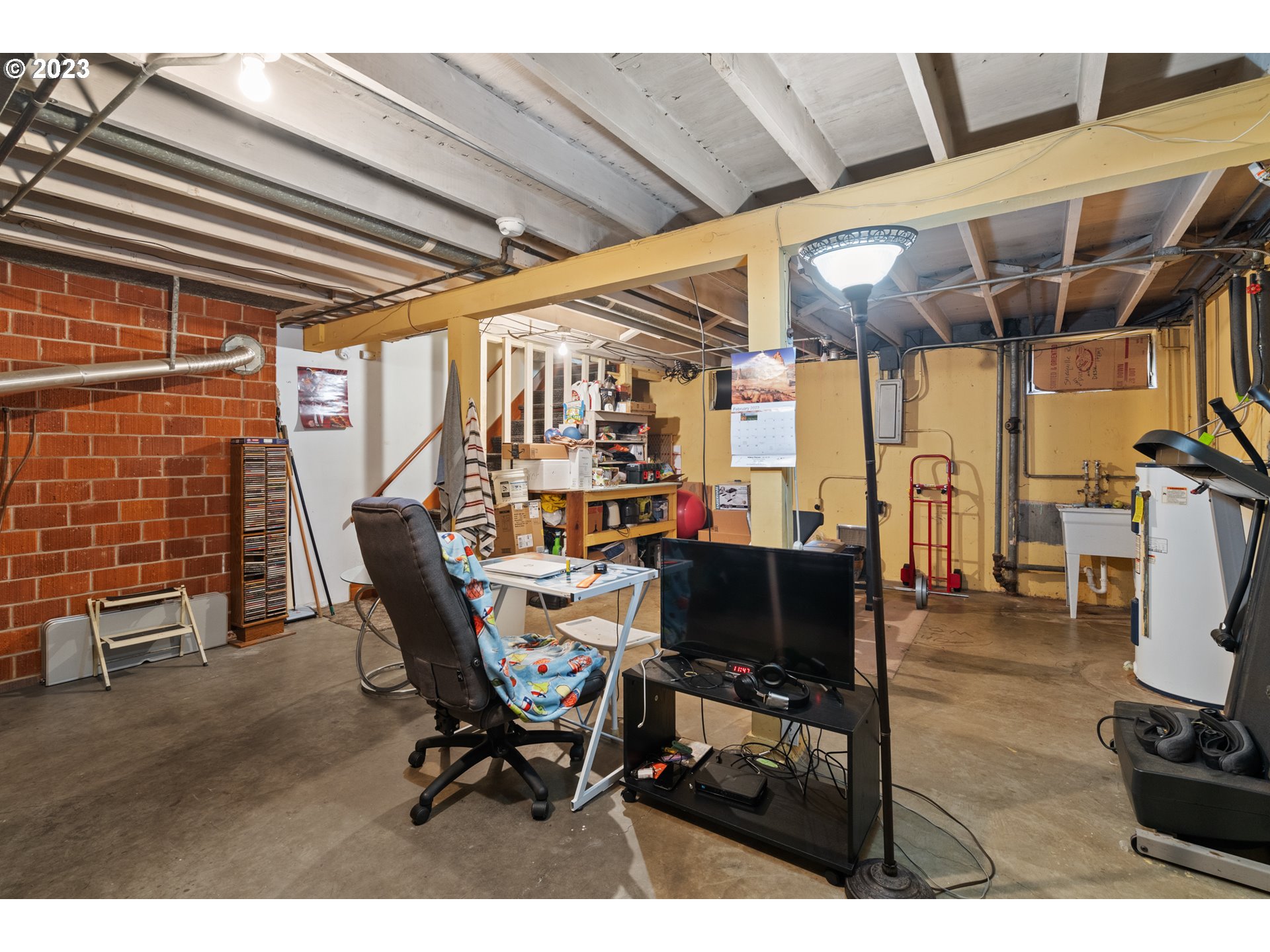 3832 North Kilpatrick Street Portland, OR 97217 - Photo 14 of 34 a view of a dining room with furniture and wooden floor