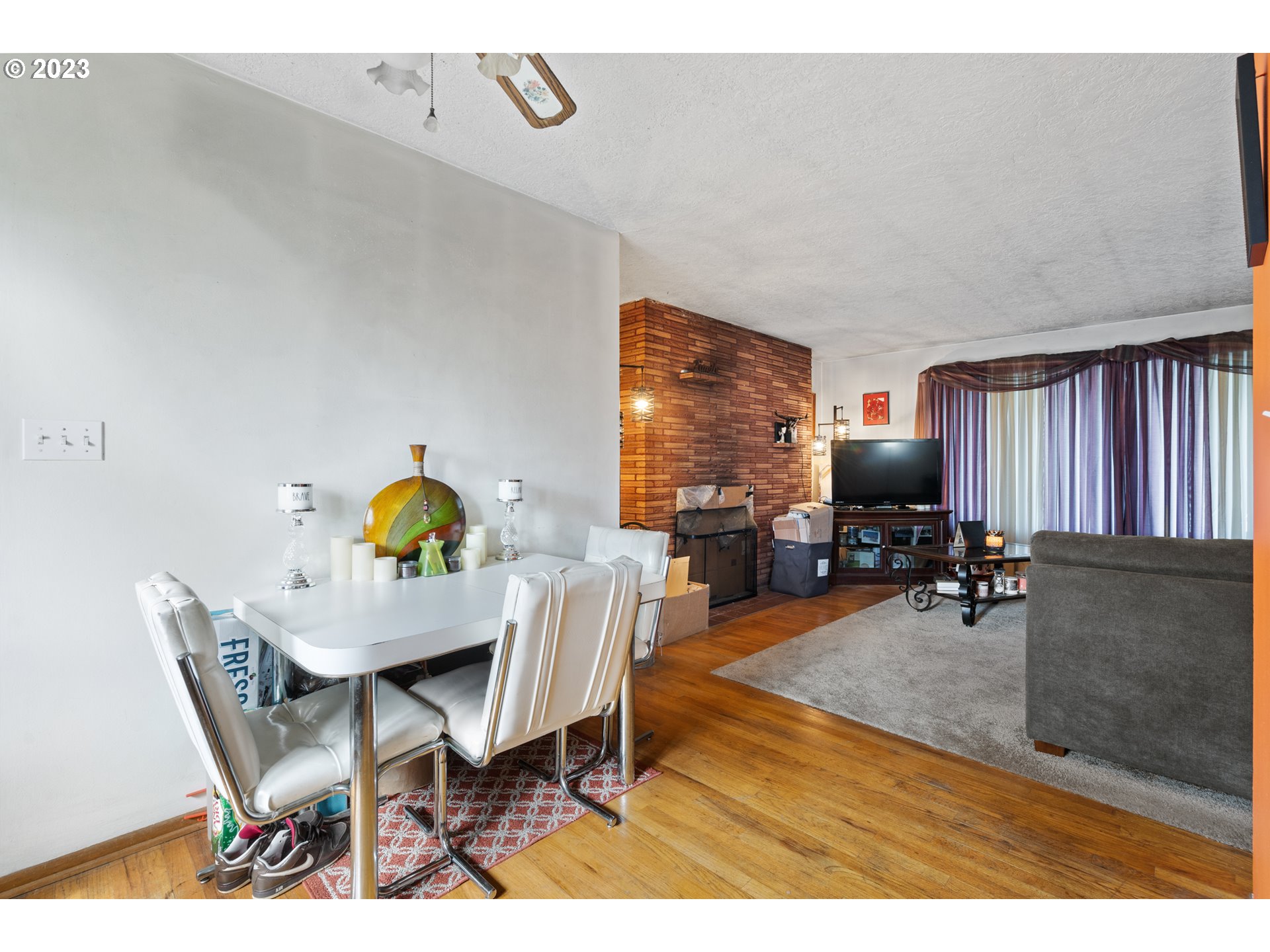 3832 North Kilpatrick Street Portland, OR 97217 - Photo 24 of 34 a view of a dining room with furniture and a window