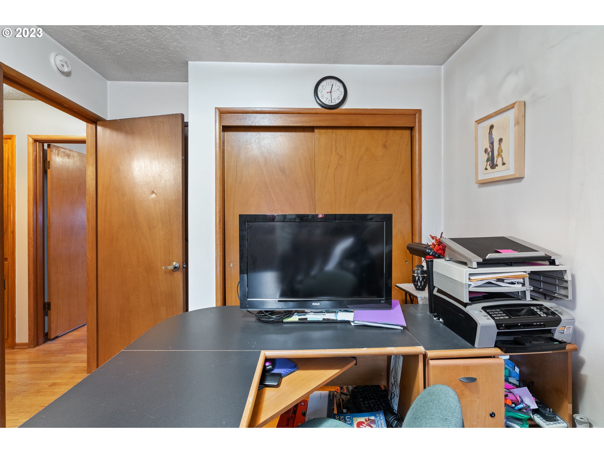 3832 North Kilpatrick Street Portland, OR 97217 - Photo 27 of 34 a living room with a flat screen tv and a fireplace