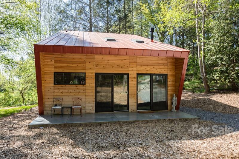 450 Lakey Gap Road Black Mountain, NC 28711 - Photo 2 of 40 a front view of a house with garden