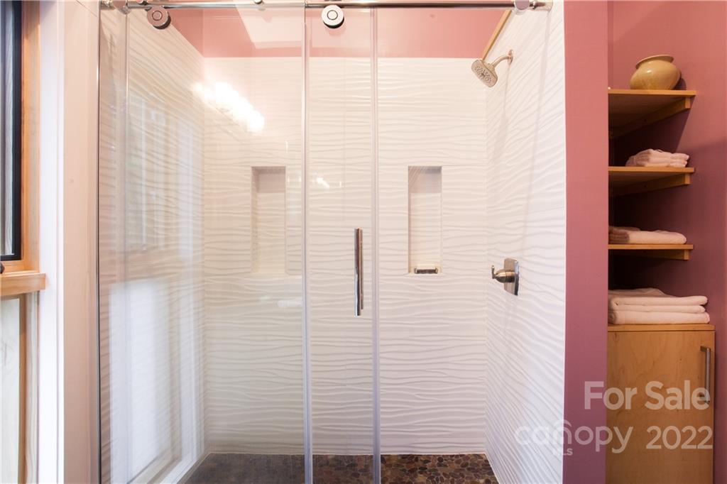 450 Lakey Gap Road Black Mountain, NC 28711 - Photo 22 of 40 a bathroom with a shower