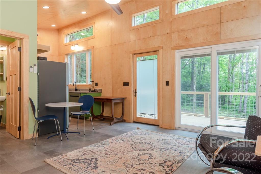 450 Lakey Gap Road Black Mountain, NC 28711 - Photo 24 of 40 a view of a livingroom with furniture and a window