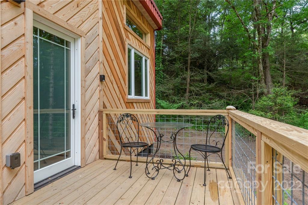 450 Lakey Gap Road Black Mountain, NC 28711 - Photo 35 of 40 a view of a two chairs and table in the balcony