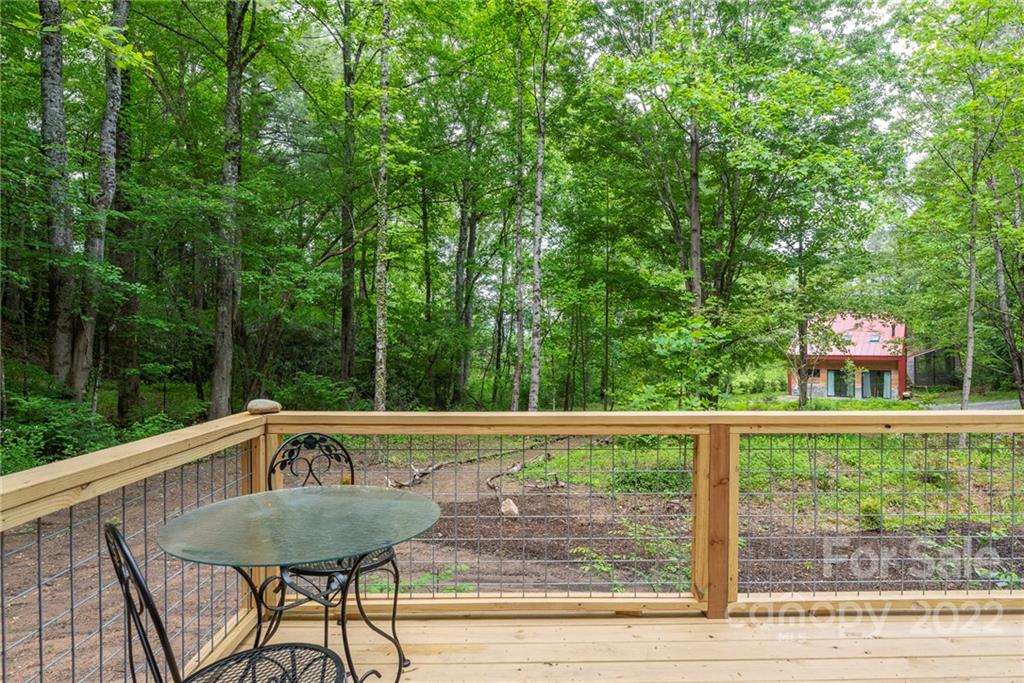 450 Lakey Gap Road Black Mountain, NC 28711 - Photo 36 of 40 a view of a two chairs in the deck