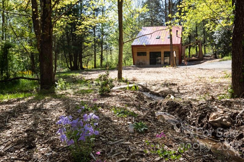 450 Lakey Gap Road Black Mountain, NC 28711 - Photo 7 of 40 a front view of a house with a yard