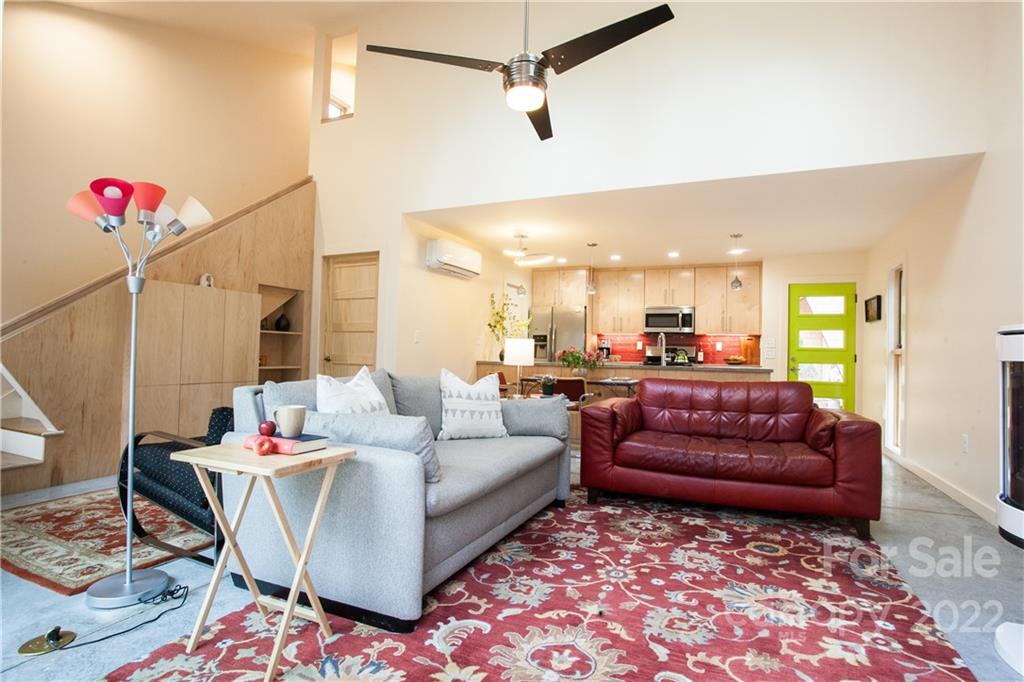 450 Lakey Gap Road Black Mountain, NC 28711 - Photo 10 of 40 a living room with furniture and a rug
